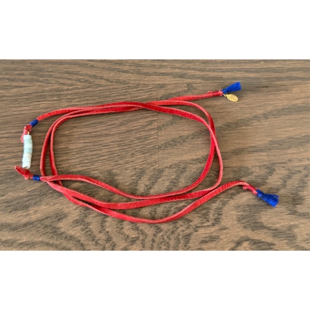 Shashi red leather wrap bracelet with beaded center